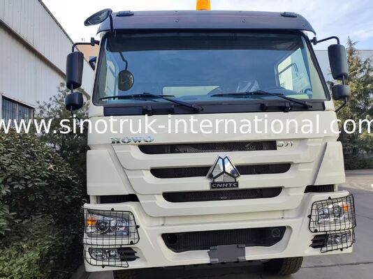 Camion benne HOWO blanc en forme de U de 371 ch avec performances supérieures de levage intermédiaire